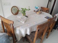 Beautiful Oval Wooden Dining table with 5 chairs